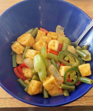 Paneer over rice with green beans and peppers at Root in Lancaster