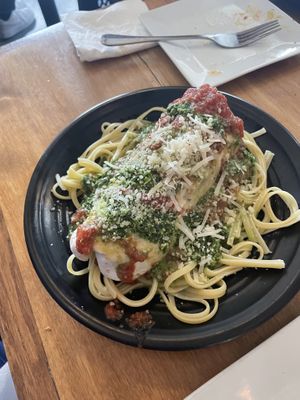 A “burrito” of meatballs and kale and cherry tomatoes over pasta with tomato sauce . Wow.  at Root in Lancaster