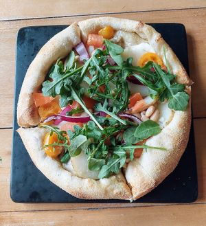 Pizza special with potatoes, white beans, and arugula at Root in Lancaster
