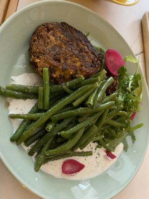 Main dish - quinoa patties. Really soooooo delicious!  at Kohvik Must Puudel in Tallinn