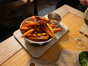 Sweet potato fries with vegan mayo and sun dried tomatoes   at Kohvik Must Puudel in Tallinn