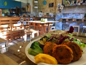 cous cous meatballs with sprouts, vegetables, seeds and almond&tumeric sauce at Basilico Food - Via Massarenti in Bologna