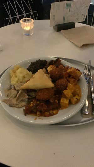 A stacked plate with a little bit of everything   at Hiltl - Dachterrasse in Zurich