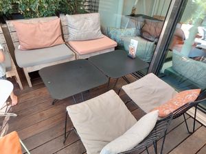 Lounge with low chairs/tables at Hiltl - Dachterrasse in Zurich