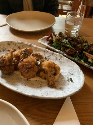 Buffalo cauliflower with sriracha mayo and Salad with fried Brussels sprouts and pickled pears   at Secret Creek Cafe in Lithgow