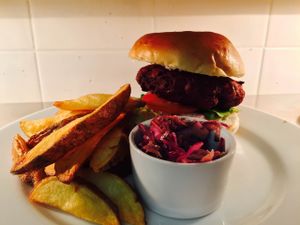 White Bean & Beetroot Burger with Baby Gem Lettuce, Red Onion, Beef Tomato, House Slaw, Hand Cut Chips (veggie, vegan with no bun)  at Broadcast in Glasgow