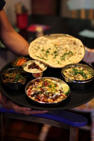 Get a bit of everything including VEGAN naan!  at Spice Box in East London