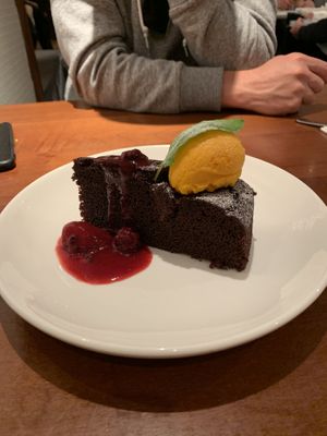 Vegan chocolate cake with mango sorbet  at Farelli's Trattoria in Queenstown