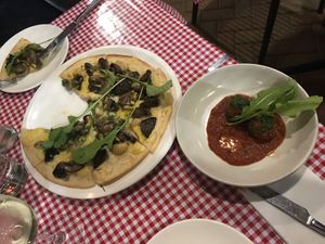 Bianco pizza and arancini (both vegan and delicious)  at Farelli's Trattoria in Queenstown