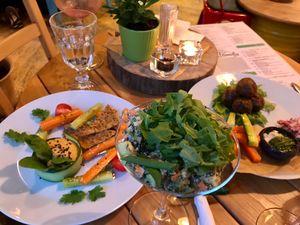 Vegetables and hummus, falafels and avocado salad. at RA Family in St Petersburg