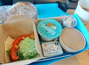 Breakfast in 1 class. Pea "hummus", vegan cheese, vegetables, butter, soygurt, muesli, jam, bread, coffe. at SJ - Swedish Railways in Stockholm