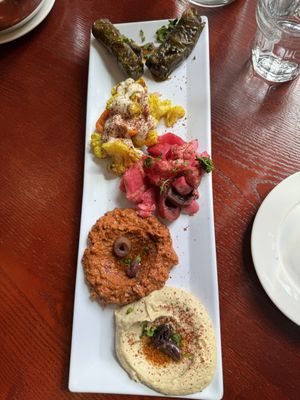 Oriental plate with dolmas, snowballs in the deserts, pickle plate, muhamarra and hummus  at Cafe Turko in Seattle