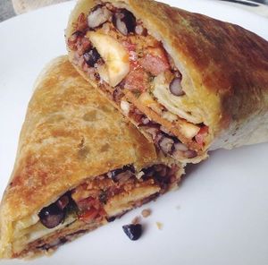 cuban burrito, red rice, black beans, fried plaintains, spicy seitan, chimichurri and pico de gallo at Green Bar in Makati