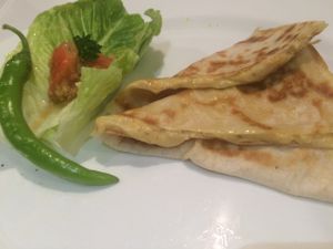 Queso pop, 3 vegan cheeses in a grilled tortilla quesadilla. Mozerella, chipotle cheddar and cream cheese  at Green Bar in Makati