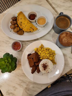 Chickpea omelette and tapa, tofu scramble with rice at Green Bar in Makati