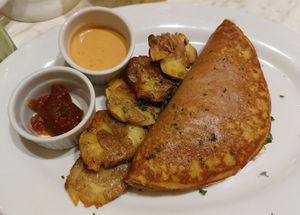 Chickpea omelette with smashed potatoes.  at Green Bar in Makati