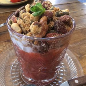 strawberry and rhubarb with coconut yogurt and mixed nuts and seeds at By Lima in Haarlem