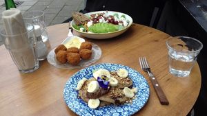 Vegan pancakes and bitterballen (vegetarian salad in the back) at By Lima in Haarlem