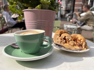 Cappuccino with pea milk and vegan apple pie  at By Lima in Haarlem