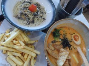 Laksa, pasta and fries at Grove - Waterway Point in Northeast Singapore