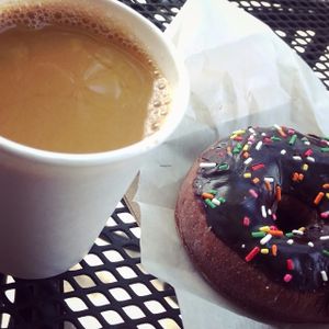 Vegan chocolate donut and soy latte. at West Town Bakery and Diner - West Town in Chicago