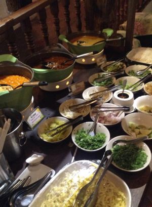 Khao Soi and toppings  at Khun Churn in Chiang Mai