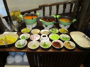 The wonderful Khao Soy table, with three different curry bases and many, many condiments.
Delicious!!! at Khun Churn in Chiang Mai