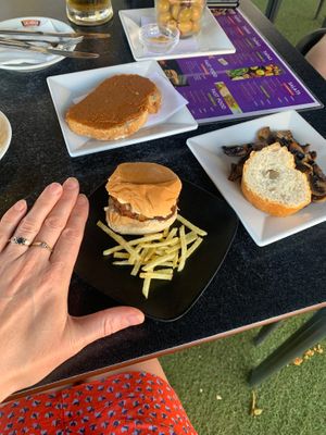 Teeny tiny zucchini burger. 
Also fearing vegetable toast, mushrooms, and olives. at Vintage 54 in Almeria