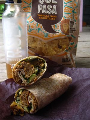 Excellent falafel wrap filled with veggies, kombucha and tortilla chips. at Amarante Epicerie Ecologique in Temiscouata-sur-le-lac