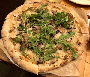 Mushroom arugula pizza at The Butcher's Daughter in Venice