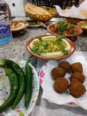 Roasted Peppers, falafel, hummus, fatoush, arabic bread at Hashem's Son Restaurant in Aqaba