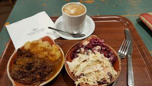 Lite lunch! Vegan Haggis & mash,  pouts 2 small salads  at Henderson's - Holyrood in Edinburgh