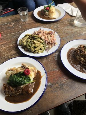 Vegan haggis and mash with a side of some pasta and coleslaw, one of the best meals we had in Edinburgh!! at Henderson's - Holyrood in Edinburgh