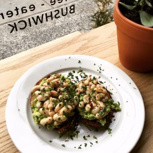 Avocado Toast with White Beans, Tahini, Parsley, Red Pepper Flakes at Routine in Brooklyn