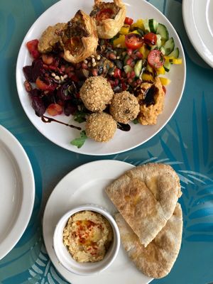 Mixed mezze platter for two with pitta bread and hummus  at Poco Culina in Cheltenham
