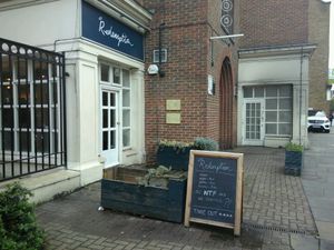 welcoming message and entrance at Redemption - Shoreditch in East London