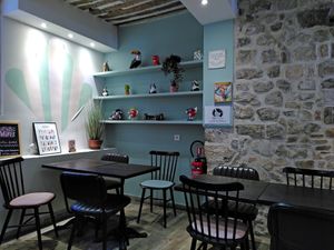 Some of the tables inside at Emilie and the Cool Kids in Antibes