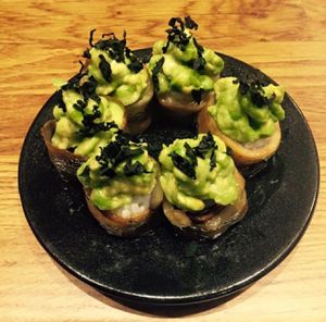 'Cake' with fired aubergine, avocado and roasted wakame at Youmiko Vegan Sushi - Hoża in Warsaw