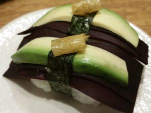 sushi with purple carrot avocado at Youmiko Vegan Sushi - Hoża in Warsaw