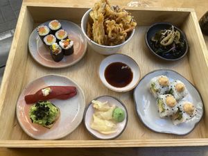 I got a bento box which comes with a selection of dishes😄 at Youmiko Vegan Sushi - Hoża in Warsaw