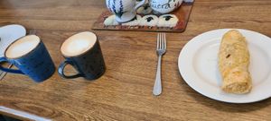 Vegan sausage roll and two Café lattés with oatmilk at Food 4 Thought in Galway