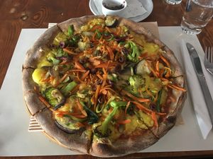 Vegan green pizza at Mystic All Day Cafe in Athens