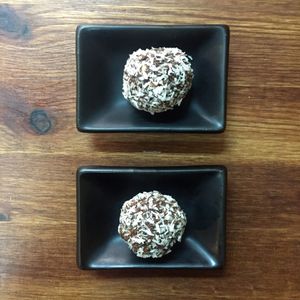 Tasty balls with almond/hasselnut butter, dates, coco & choco.  at VA De BO in Mallorca