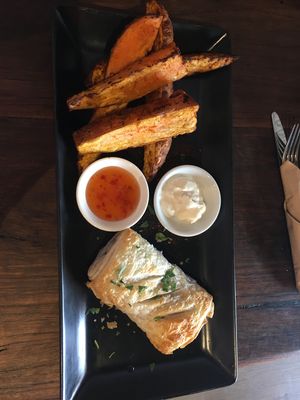 “Sausage” walnut roll and sweet potato fries  at Kemu in Terrigal