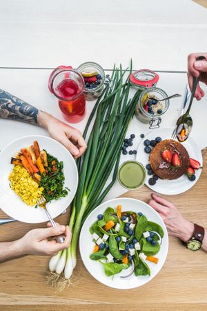 Breakfast at Lifemotiv: tofu scrabble with kale and sweet potato almond pancakes, spinach&blueberries salad with tofu a la feta, overnight oats and xylitol cranberry lemonade at Lifemotiv in Warsaw