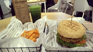 Avocado burger with sweet potato fries. at Lifemotiv in Warsaw