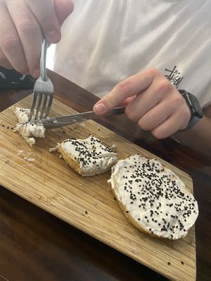 Plain cream cheese bagel at The Pitted Date in Playa Del Carmen