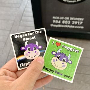 Happy cow stiker 🌸 at The Pitted Date in Playa Del Carmen