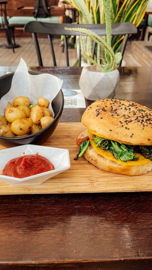 Croissant sandwich but as a bagel at The Pitted Date in Playa Del Carmen