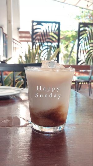 Home made iced latte with almond milk at The Pitted Date in Playa Del Carmen